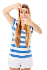 Fototapeta premium Girl makes a frame arms