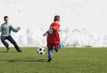 Foto op Plexiglas Kids soccer football tournament - children players match on soccer field © Dusan Kostic