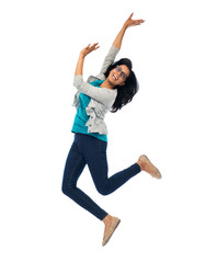 smiling young indian woman jumping in air