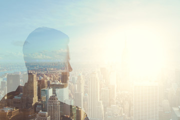 Plakat Male silhouette on city background