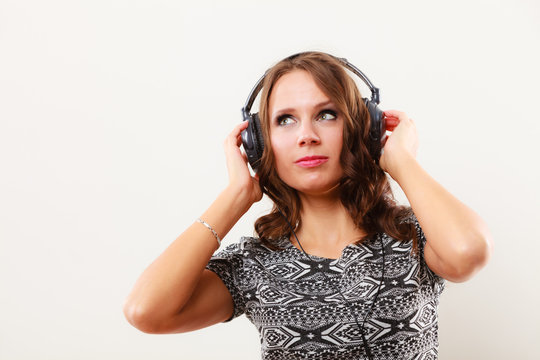 woman in headphones listening music mp3 relaxing