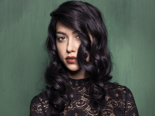 Model wearing black transparent blouse