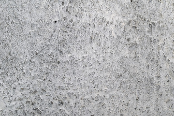 Old gray concrete wall with white abrasion background.