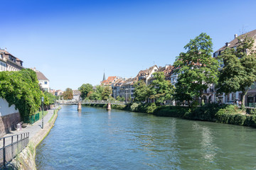 Fototapeta na wymiar STRASBOURG, FRANCE - August 23, 2016 : Street view of Traditional houses in Strasbourg, Alsace. is the official seat of the European Parliament, Located close to the border with Germany