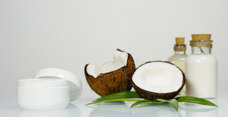 Fresh nourishing coconut milk moisturizing cream for hands, face and skin isolated on a white background, concept: spa, skincare, beauty, healthy lifestyle, bio products, ecologic products, massage.