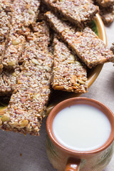 Kozinaki from sesame and peanut seeds of sunflower and pumpkin and other nuts