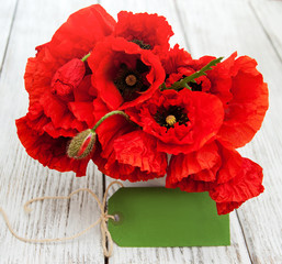 Poppy flowers with card