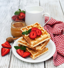 belgian waffles with strawberries and mint