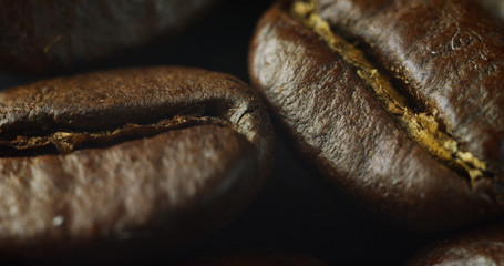 the raw coffee beans in the professional roasting, grilling at the right temperature in slow motion. concept of perfect coffee, Italian and Ethiopian roasting, nature and food.	