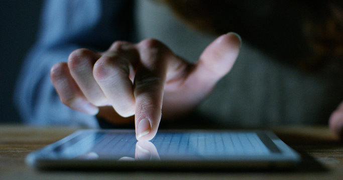 hand typing and touch a screen LCD and interacts with applications and finance and mathematical charts. concept of Technology and simple technology concept applied to the average user friendly.	 - Powered by Adobe