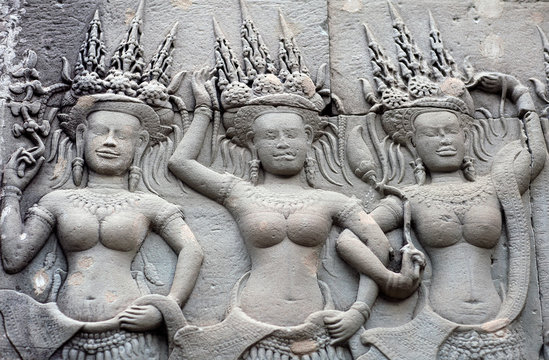 Ancient relief with Apsaras at Angkor Wat Temple, Cambodia