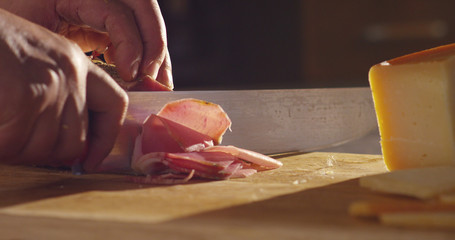 old hand experienced slices Parma ham Italian very fine and he savored the taste and goodness
