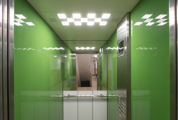 modern elevator, green interior