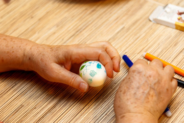 Painting Easter eggs at home before Easter