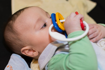 Baby boy playing with toy