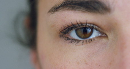 perfect woman brown eye macro in a sterile environment	