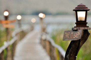 landscape of pond and bamboo walk way background