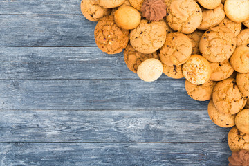 Cookies and biscuits at blue wood with copy space