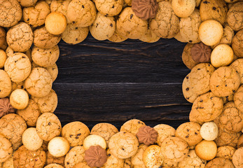 Cookies and biscuits at brown wood with copy space