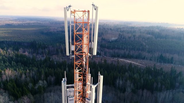 13410_The_top_of_the_GSM_cell_tower_in_the_middle_of_the_forest.mov