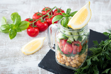 fresh vegetarian salad of chickpeas and vegetables