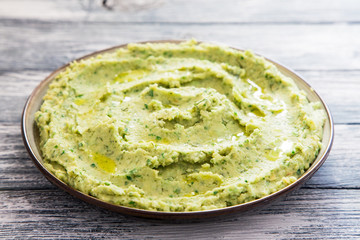 Healthy avocado hummus with olive oil. vegetarian concept. selective focus