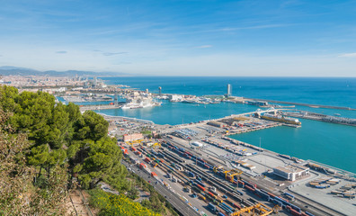 Beautiful Blue commerce in the ports of Spain in Barcelona.  Balearic sea & industrial shipping & rail ports on a blue-sky sunny day. - 145577790