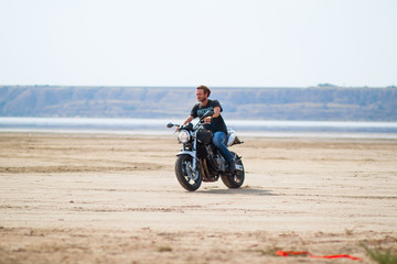 Fototapeta na wymiar motorcycle rider in desert 