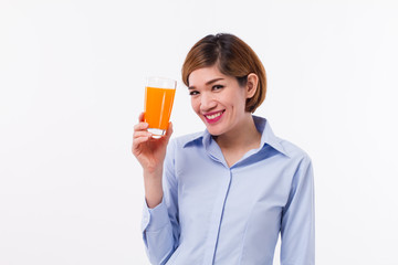 healthy asian woman holding glass of orange juice