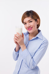healthy asian woman holding glass of milk