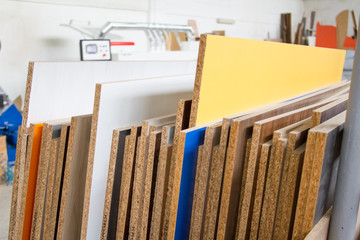 MDF, PARTICLE BOARD. Wood panels of different thicknesses and colors.