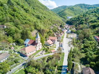Obraz premium Sasca Montana village in Cheile Nerei National Park Romania