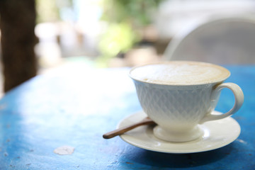 cappuccino coffee in blue vintage