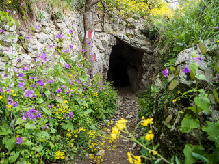 Otoman rock tunnels in National Park Cheile Nerei Romania. Popular hike path in the summer