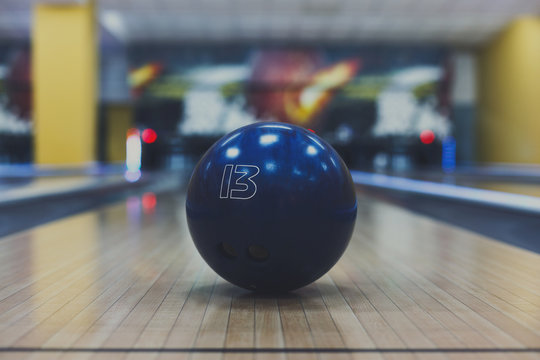 Bowling ball closeup on lane background