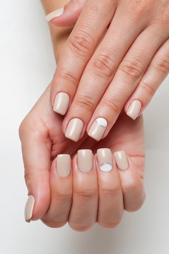 Wedding soft beige manicure with silver on square nails 