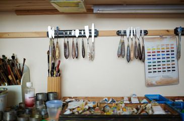 Collection of artistry objects and tools in workroom