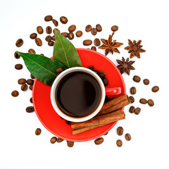 Red ceramic coffee Cup with coffee and cinnamon on a white background.