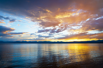 Fototapeta na wymiar Dramatic sunset over the lake Hovsgol, Mongolia 
