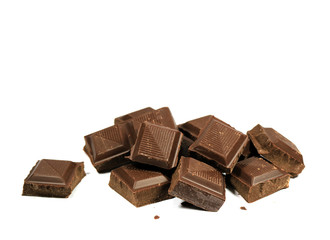Closed Up Pile of Chocolate Cubes Isolated on White Background 