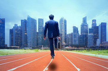 Fototapeta premium Business person stepping up a staircase, Concept of success and achieving your goal
