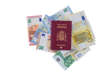 Obraz na płótnie Canvas Different euro banknotes under a Spanish travel passport.