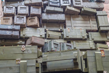 Stacks of old military ammunition boxes in specific ukrainian restaurant © iamjura
