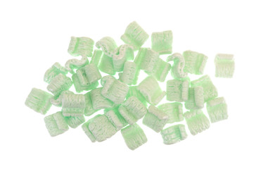 Top view of a group of green packing peanuts isolated on a white background.