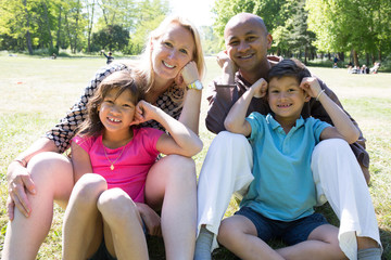 Multiracial Family with Children Enjoys Summer Holidays in the Sun