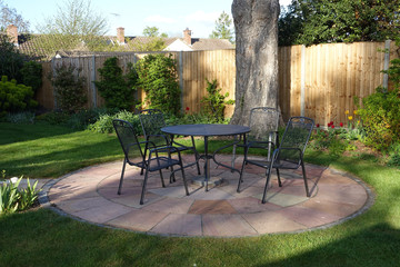 Patio in an English garden in the evening light