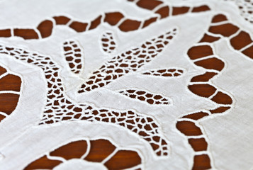 Needlework. Fragment of an openwork table napkin embroidered in Richelieu technique