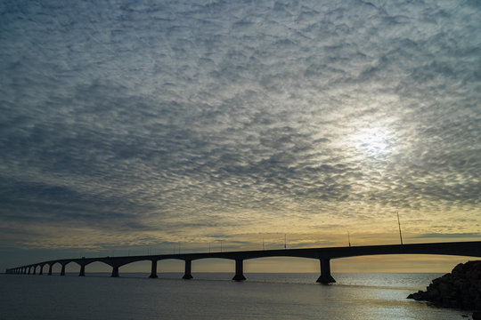 Cloudy skies over the Confederation Bridge linking Prince Edward Island with mainland New Brunswick, Canada.
