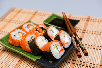 sushi plates and chopsticks