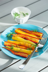 roasted colorful carrots on plate